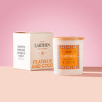 Earthen Candle with wooden lid on a pink background