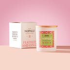 Nopalli Candle with wooden lid on a pink background