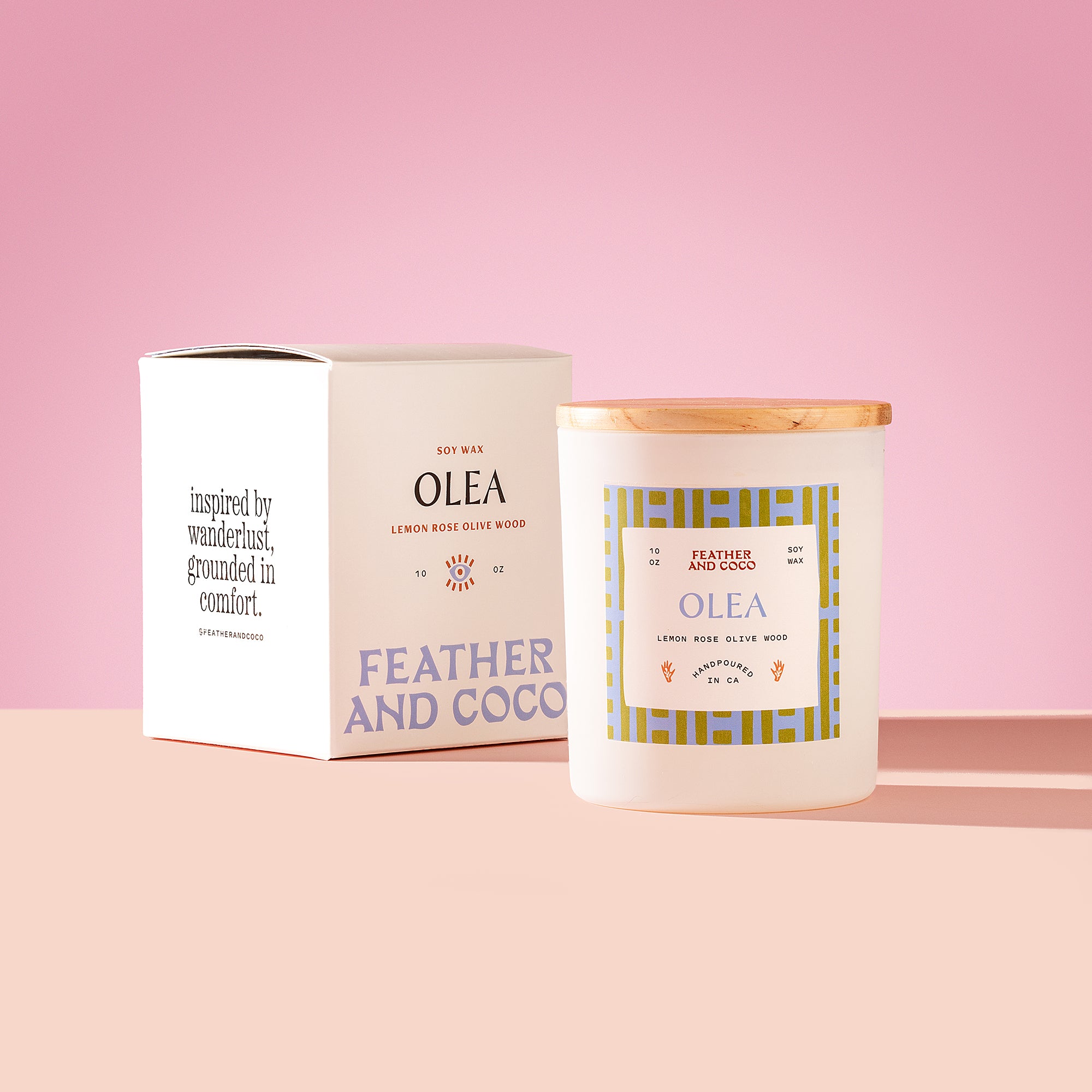 Olea Candle with wooden lid on a pink background