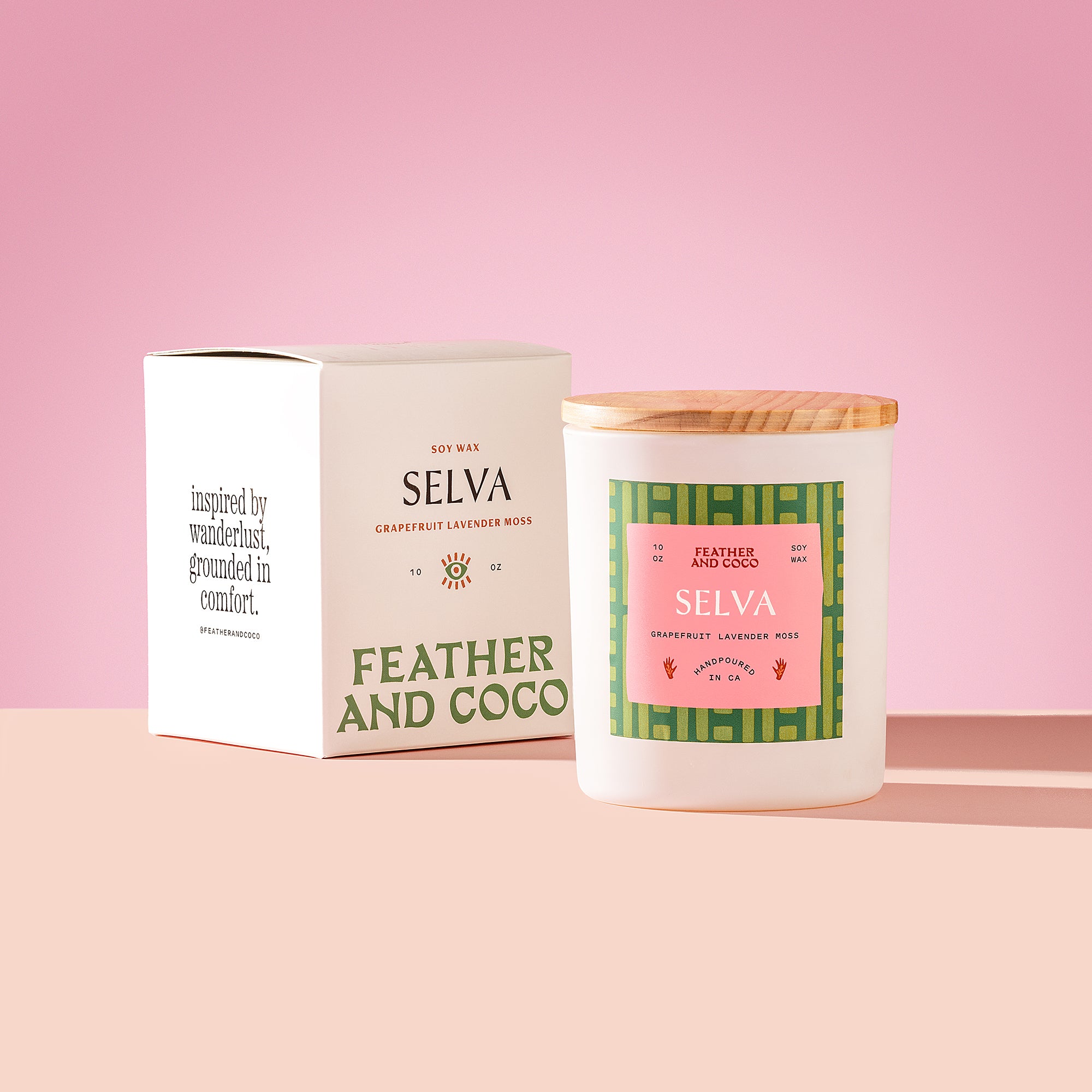 Selva Candle with wooden lid on a pink background